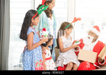 Indian family celebrating Christmas Stock Photo