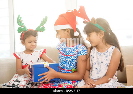 Happy Indian children celebrating Christmas Stock Photo