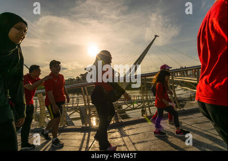 The Darul Hana Bridge in Kuching is the only pedestrian bridge that connects the North and South of Kuching at the moment. Stock Photo