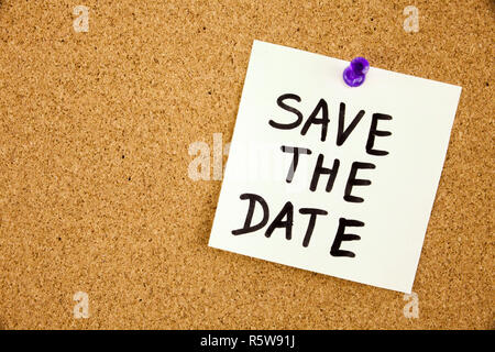 Save the date on cork board background Concept Stock Photo