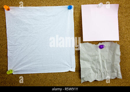 colorful sticky notes on cork bulletin board Stock Photo