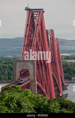 A Scotrail class 170 turbostar train at North Queensferry, leaving the  Forth rail Bridge heading north Stock Photo