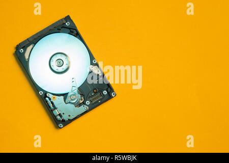 Colorful hdd. open hard disk drive. The concept of data storage. data array. hard drive from the computer. hdd with mirror effect Stock Photo