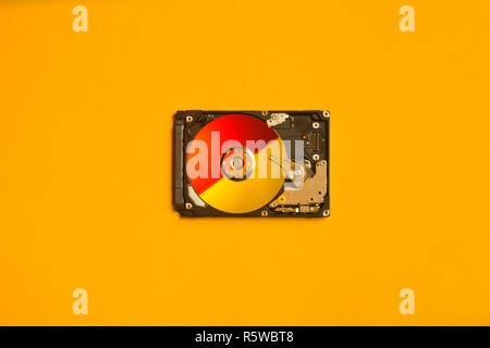 Colorful hdd. open hard disk drive. The concept of data storage. data array. hard drive from the computer. hdd with mirror effect Stock Photo