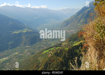 Panorama view on valleys and mountains (Texel Group) in the italian alps standing at the cableway station Hochmuth (Meran, South Tyrol, Italy) Stock Photo