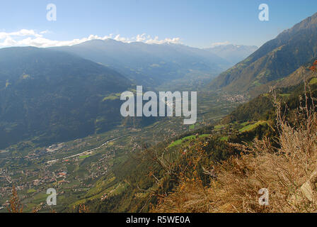 Panorama view on valleys and mountains (Texel Group) in the italian alps standing at the cableway station Hochmuth (Meran, South Tyrol, Italy) Stock Photo