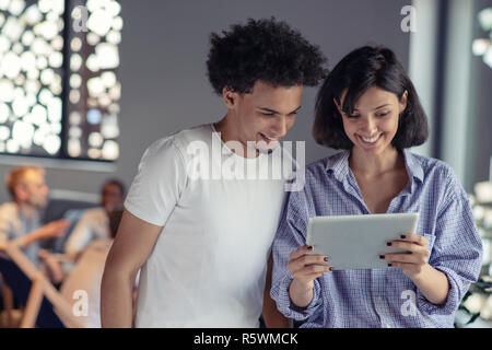 business, technology, startup and people concept - happy creative team with tablet pc computers in office Stock Photo