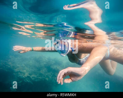 woman snorkel in shallow water Stock Photo