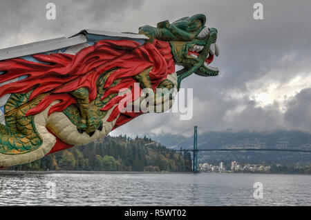 Vancouver, Canada - October 1, 2018: Closeup of monument displaying the figurehead of SS Empress of Japan looking over the waters of the harbour under Stock Photo