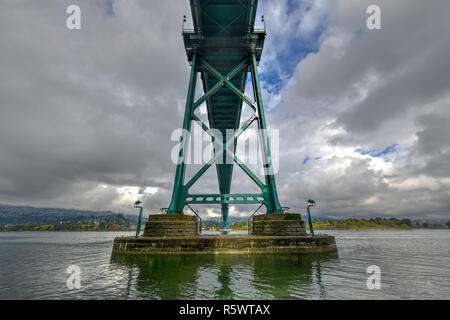 Lions Gate Bridge as seen from Stanley Park in  Vancouver, Canada. The Lions Gate Bridge, opened in 1938, officially known as the First Narrows Bridge Stock Photo