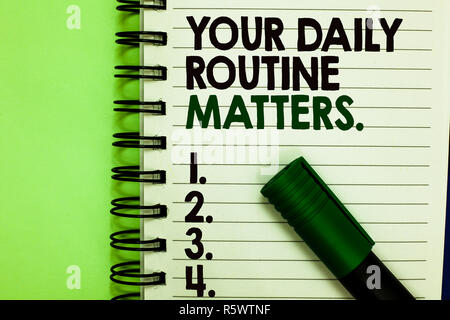 Handwriting text Your Daily Routine Matters. Concept meaning Have good habits to live a healthy life Written letters and numbers on notepad laid green Stock Photo