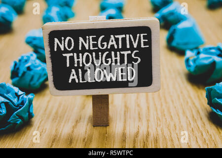 Handwriting text writing No Negative Thoughts Allowed. Concept meaning Always positive motivated inspired good vibes Stand blackboard with white words Stock Photo