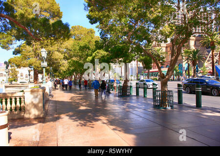 People walking along the Parisian sidewalk in Paris, Las Vegas, Nevada Stock Photo