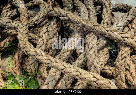 inen rope in view as a thread background Stock Photo