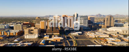 Late afternoon sun lights the buildings in the downtown urban core of Phoenix Arizona Stock Photo