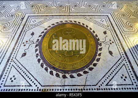 Chicago, Illinois, USA. Detailed, inlaid tile flooring that includes a seal of the City of Chicago near an entrance to the Chicago Cultural Center. Stock Photo
