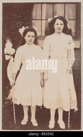 * Vintage Photographic Postcard of Two Girls Dressed Up For The St Johns Fairy Dance in 1910. Stock Photo