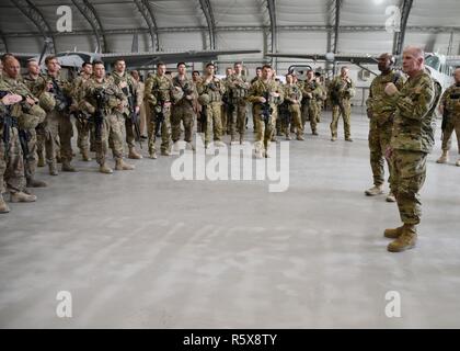 Gen. Stephen Wilson, Vice Chief of Staff of the Air Force, addresses Train, Advise, Assist Command-Air (TAAC-Air) advisors at Kabul Air Wing, Afghanistan, April 13, 2017. Wilson; Chief Master Sgt. of the Air Force Kaleth O. Wright; Maj. Gen. James Hecker, 9th Air and Space Expeditionary Task Force-Afghanistan commander; and Chief Master Sgt. Lisa Arnold, 9th AETF-A command chief; visited the 438th Air Expeditionary Wing and TAAC-Air. Brig. Gen. David Hicks, 438th AEW and TAAC-Air commander, and a contingent of TAAC-Air Coalition and Afghan Air Force members gave the visitors a tour of AAF airc Stock Photo