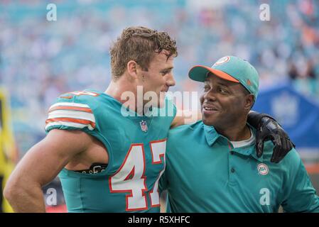 Miami, Florida, USA. 2nd Dec, 2018. 47 Kiko Alonso elebrating a victory  with coach Tony Oden during the Miami Dolphins v Buffalo Bills on December  2, 2018 Credit: Dalton Hamm/ZUMA Wire/Alamy Live