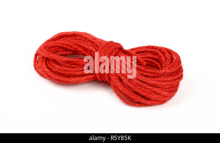 Red jute twine coil skein isolated on white Stock Photo