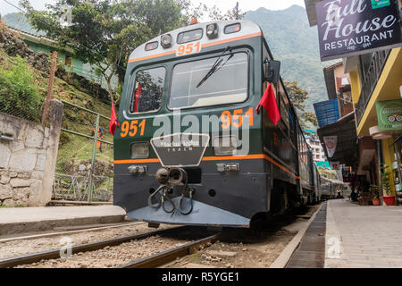 Peru Rail train arriving at Machu Picchu Station Stock Photo