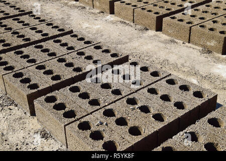 Cinder blocks lie on the ground and dried. on cinder block produ Stock Photo