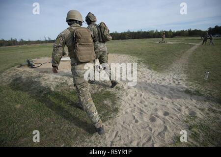 https://l450v.alamy.com/450v/r5yr1p/us-army-staff-sgt-edward-french-an-instructor-at-the-defense-information-school-and-staff-sgt-enoch-fleites-a-combat-documentation-production-specialist-assigned-to-the-55th-signal-company-combat-camera-moves-to-a-firing-position-during-the-m4-stress-shoot-event-portion-of-the-2017-5th-annual-spc-hilda-i-clayton-best-combat-camera-comcam-competition-at-fort-ap-hill-va-april-18-2017-french-and-fleites-are-competing-in-the-2017-5th-annual-best-comcam-competition-where-teams-of-two-compete-throughout-a-weeklong-event-that-tests-their-physical-mental-and-technical-capabili-r5yr1p.jpg