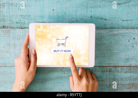 Shopping online concept. Close-up woman hands touching on digital tablet screen. Stock Photo
