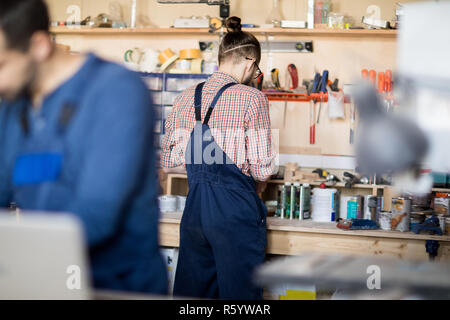 Young Man Working in Joinery Stock Photo