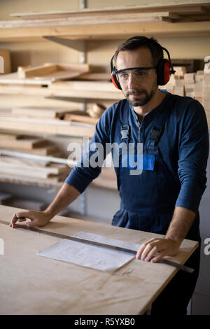 Carpenter in Shop Stock Photo