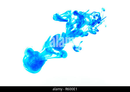 Splash of blue paint in water Stock Photo