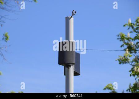 The loudspeaker on the pole. Outdoor speakers for fun walking in Stock Photo