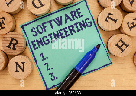 Handwriting text Software Engineering. Concept meaning Program Development in Systematic Quantifiable approach. Stock Photo