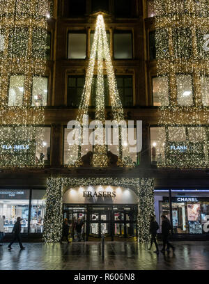 Exterior or and entrance to the Frasers Department Store in Bucanan Street, central Glasgow, Scotland, decorated with cascading lights for Christmas.  Stock Photo