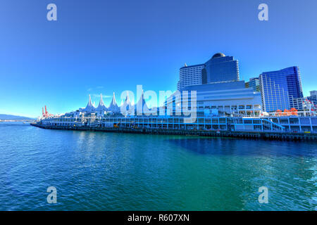 Canada Place and commercial buildings in Downtown Vancouver along Vancouver Harbour. Stock Photo