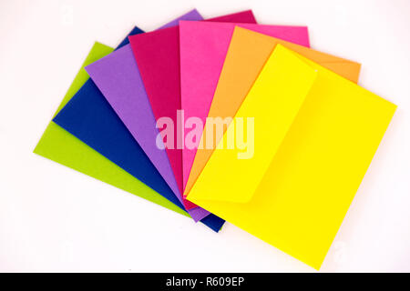 Different colored envelopes on the table. Stock Photo