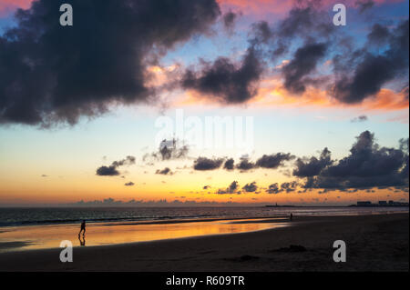 runner on the beach at cadiz on the atlantic ocean in the sunset Stock Photo