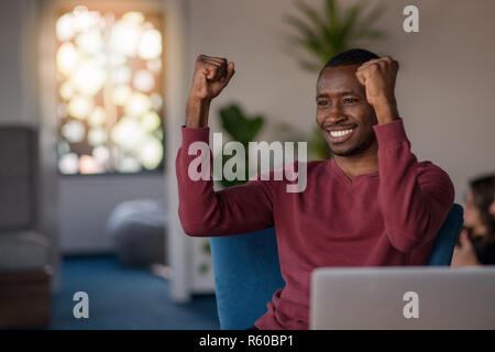 Close-up Of Person Typing On Laptop At startup office. Stock Photo