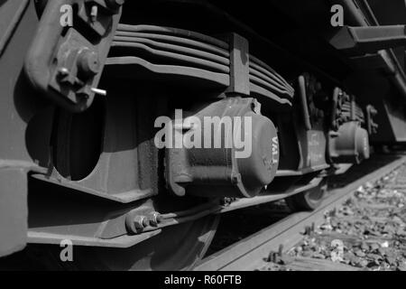 railway train wheels bogie black white Stock Photo