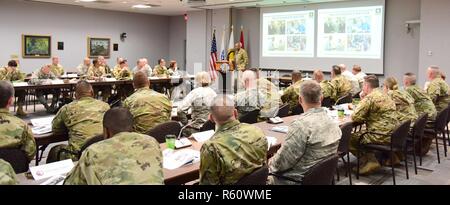 Army Maj. Gen. Leslie C. Smith, Deputy Inspector General, U.S. Army, speaks with National Guard Inspectors Generals during the IG workshop, at the Herbert R. Temple, Jr. Army National Guard Readiness Center, Arlington, Va., April 20, 2017. The NG IG workshop provided an opportunity for NG IGs from the 50 States, 3 Territories and District of Columbia, to collectively establish future courses of action for program improvements. IGs were also briefed on updated IG regulations, policy changes, and NG specific topics. (Air National Guard Stock Photo