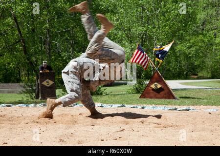 U.S. Army Rangers display their combative capabilities at the 5th Ranger Open House 2017 on Camp Merrill Ga., April 22, 2017. The 5th Ranger Training Battalion Open House 2017, welcomes the community of Dahlonega Ga., to display the skills and technical abilities of the U.S. Army Ranger. Stock Photo