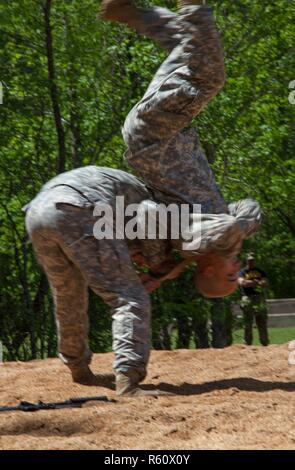 U.S. Army Rangers display their combative capabilities at the 5th Ranger Open House 2017 on Camp Merrill Ga., April 22, 2017. The 5th Ranger Training Battalion Open House 2017, welcomes the community of Dahlonega Ga., to display the skills and technical abilities of the U.S. Army Ranger. Stock Photo