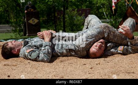 U.S. Army Rangers display their combative capabilities at the 5th Ranger Open House 2017 on Camp Merrill Ga., April 22, 2017. The 5th Ranger Training Battalion Open House 2017, welcomes the community of Dahlonega Ga., to display the skills and technical abilities of the U.S. Army Ranger. Stock Photo