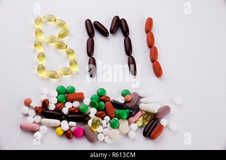 Conceptual Hand writing text caption inspiration Medical care Health concept written with pills drugs capsule word Acronym BMI - Body Mass Index On white isolated background with copy space Stock Photo