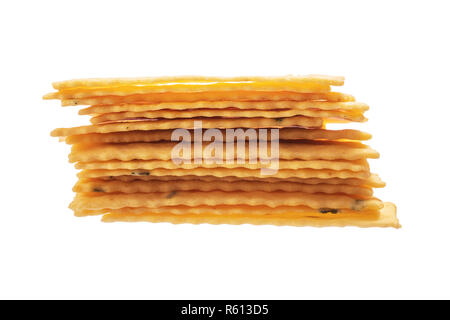 Stack of Cheese thin crackers isolated on white background Stock Photo