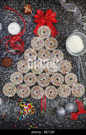 Colored chocolate rings with Christmas decoration Stock Photo