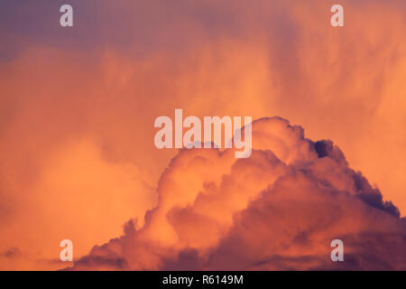Wonderful dramatic clouds and sky background. Colorful nature landscape scene with cloudy skies at sunset Stock Photo