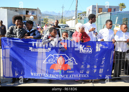 CAPE TOWN, SOUTH AFRICA - Wednesday 29 August 2018, members of the public, school children and residents of Lumka Street in Nomzamo in Strand, participate in the Western Province Athletics (WPA) Street Athletics programme.  Children of all ages and adults, get to run various distances from 50m to 200m in a closed-off street within a residential area. These events are organised by the WPA Development office. Photo by Roger Sedres for WP Athletics Stock Photo