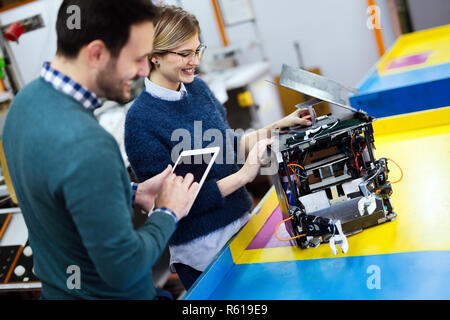 Young students of robotics working on project Stock Photo
