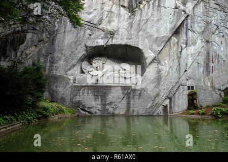 The Lion Monument or the Lion of Lucerne, designed by Bertel Thorvaldsen is a rock relief in Lucerne, Switzerland Stock Photo